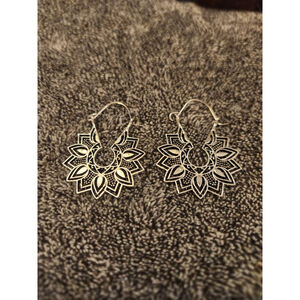 Floral Mandala Silver Tone Earrings with a hoop closure